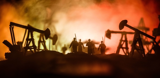oil field after explosion with workers